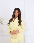 Tailleur piume gialli
