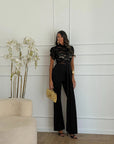 jumpsuit in pizzo nero