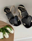 Sandalo in pelle nero e bianco