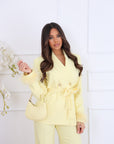 Tailleur piume gialli