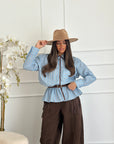 Camicia a righe celeste