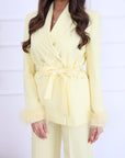Tailleur piume gialli