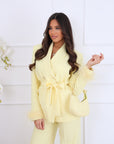 Tailleur piume gialli
