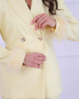 Tailleur piume gialli